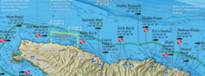 blurred image of our private boater's map of Santa Cruz Island showing popular fishing and diving spots, fishing regulation boundaries and dinghy landings